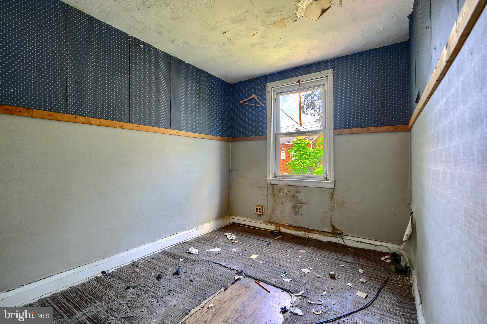 2837 Round Road Baltimore, MD 21225 - Photo 10 of 18 a view of an empty room and window