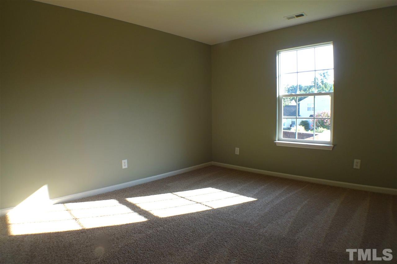 3813 Tyler Bluff Lane Raleigh, NC 27616 - Photo 20 of 25 a view of empty room with window