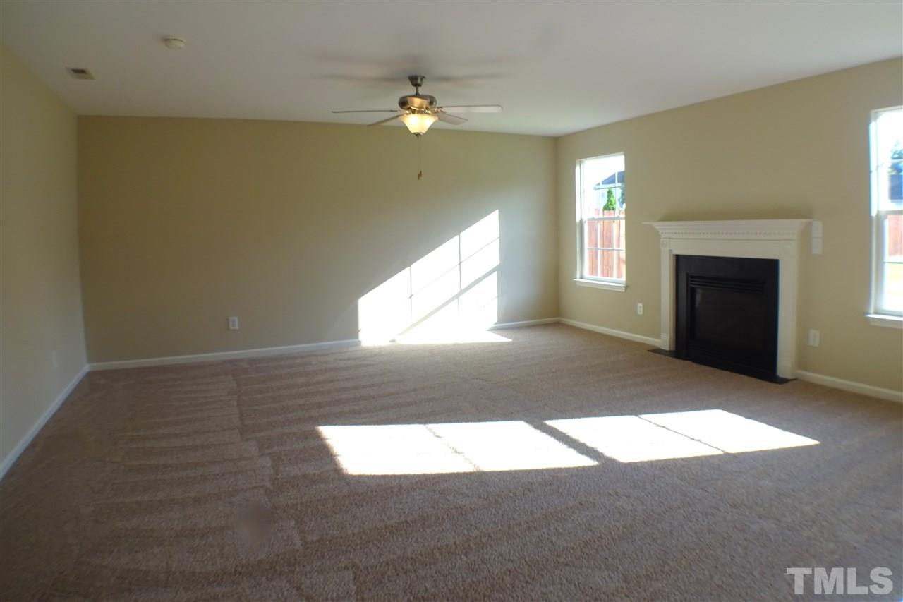 3813 Tyler Bluff Lane Raleigh, NC 27616 - Photo 10 of 25 a view of an empty room and window