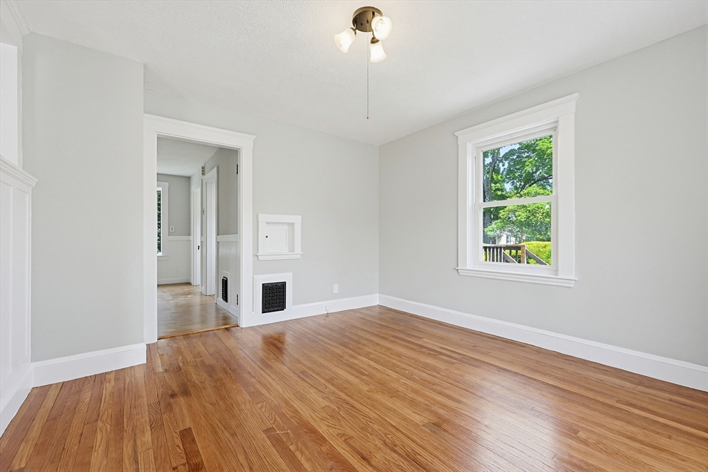 10 Water Street Natick, MA 01760 - Photo 8 of 35 a bedroom with a bed and a window