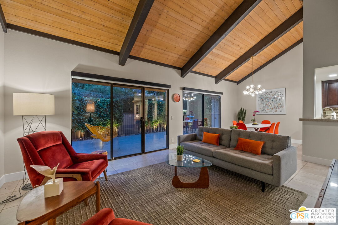 a outdoor living space with furniture and garden view