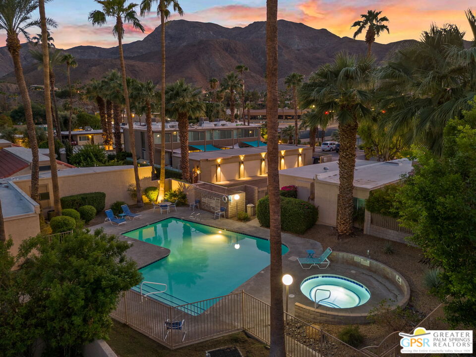 70100 Mirage Cove Drive, Unit 10 Rancho Mirage, CA 92270 - Photo 23 of 68 a view of a swimming pool with a patio and mountain view