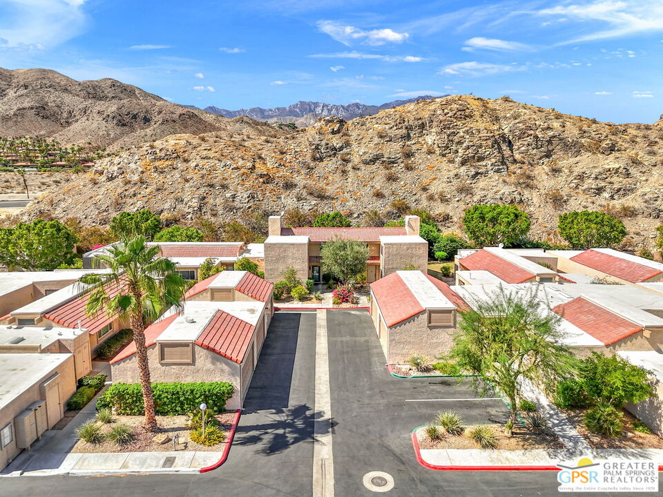 70100 Mirage Cove Drive, Unit 10 Rancho Mirage, CA 92270 - Photo 27 of 68 a view of a city with tall buildings