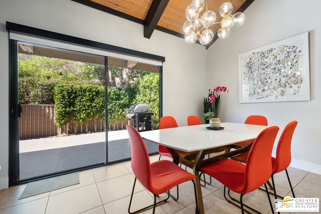 70100 Mirage Cove Drive, Unit 10 Rancho Mirage, CA 92270 - Photo 40 of 68 a view of a dining room with furniture window and outside view