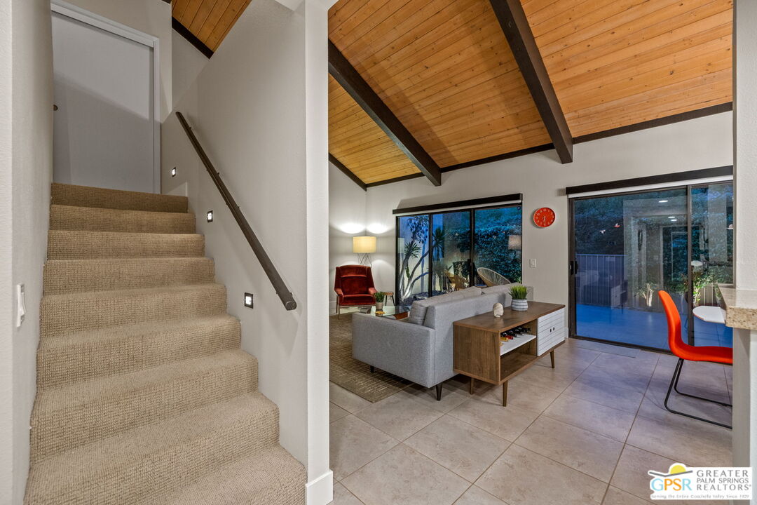 70100 Mirage Cove Drive, Unit 10 Rancho Mirage, CA 92270 - Photo 6 of 68 a view of living room filled with furniture and white walls