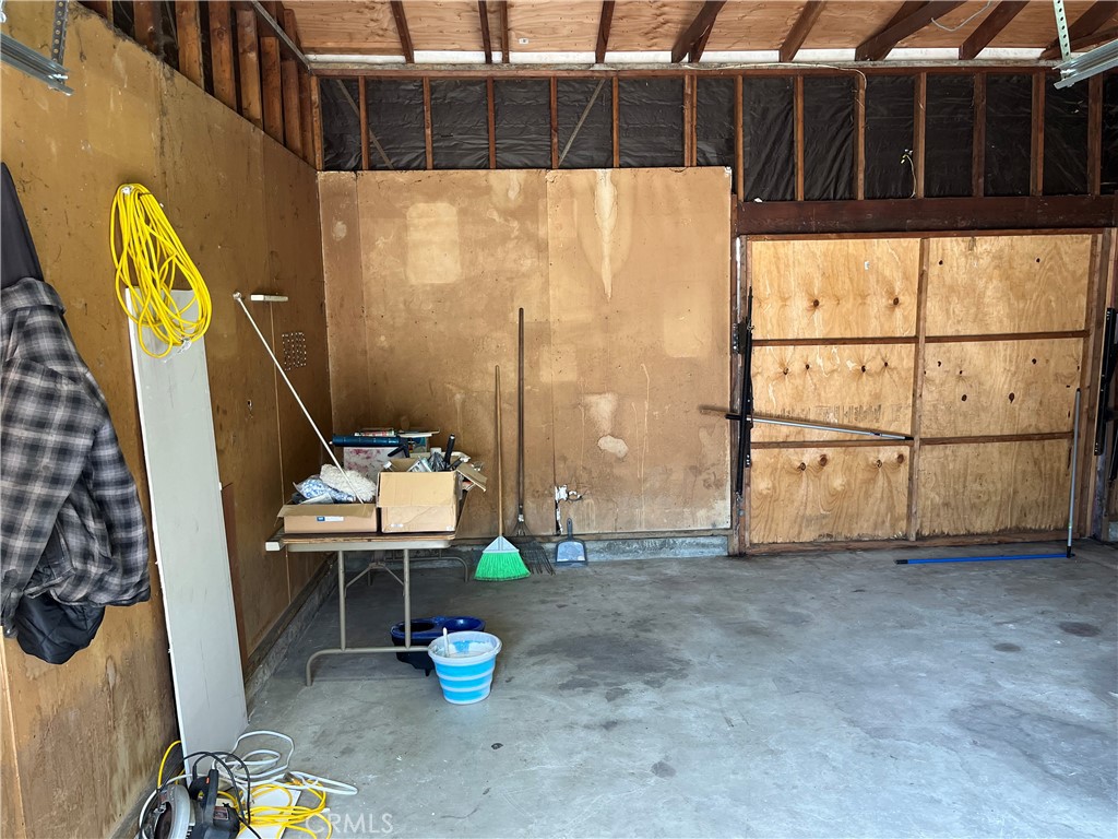 7763 Compton Avenue Los Angeles, CA 90001 - Photo 20 of 20 a backyard of a house with table and chairs