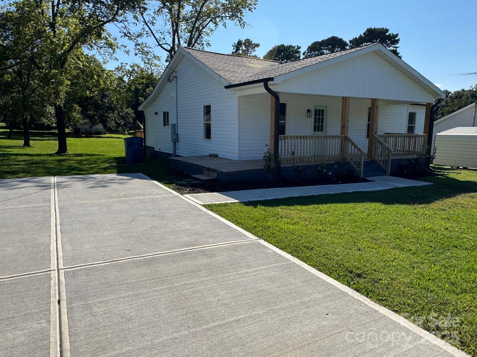 1018 Union Street Maiden, NC 28650 - Photo 2 of 46 a house view with a garden space