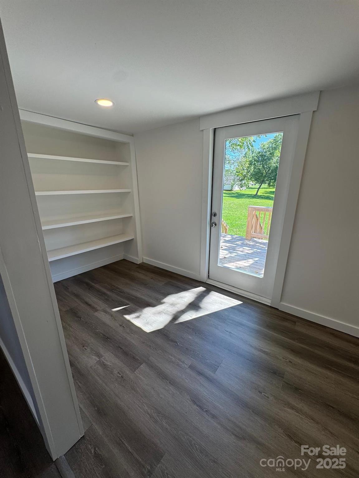 1018 Union Street Maiden, NC 28650 - Photo 30 of 46 a view of empty room with wooden floor and fan