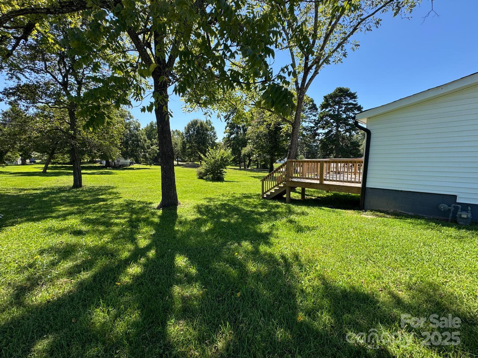 1018 Union Street Maiden, NC 28650 - Photo 33 of 46 a view of a backyard with large trees