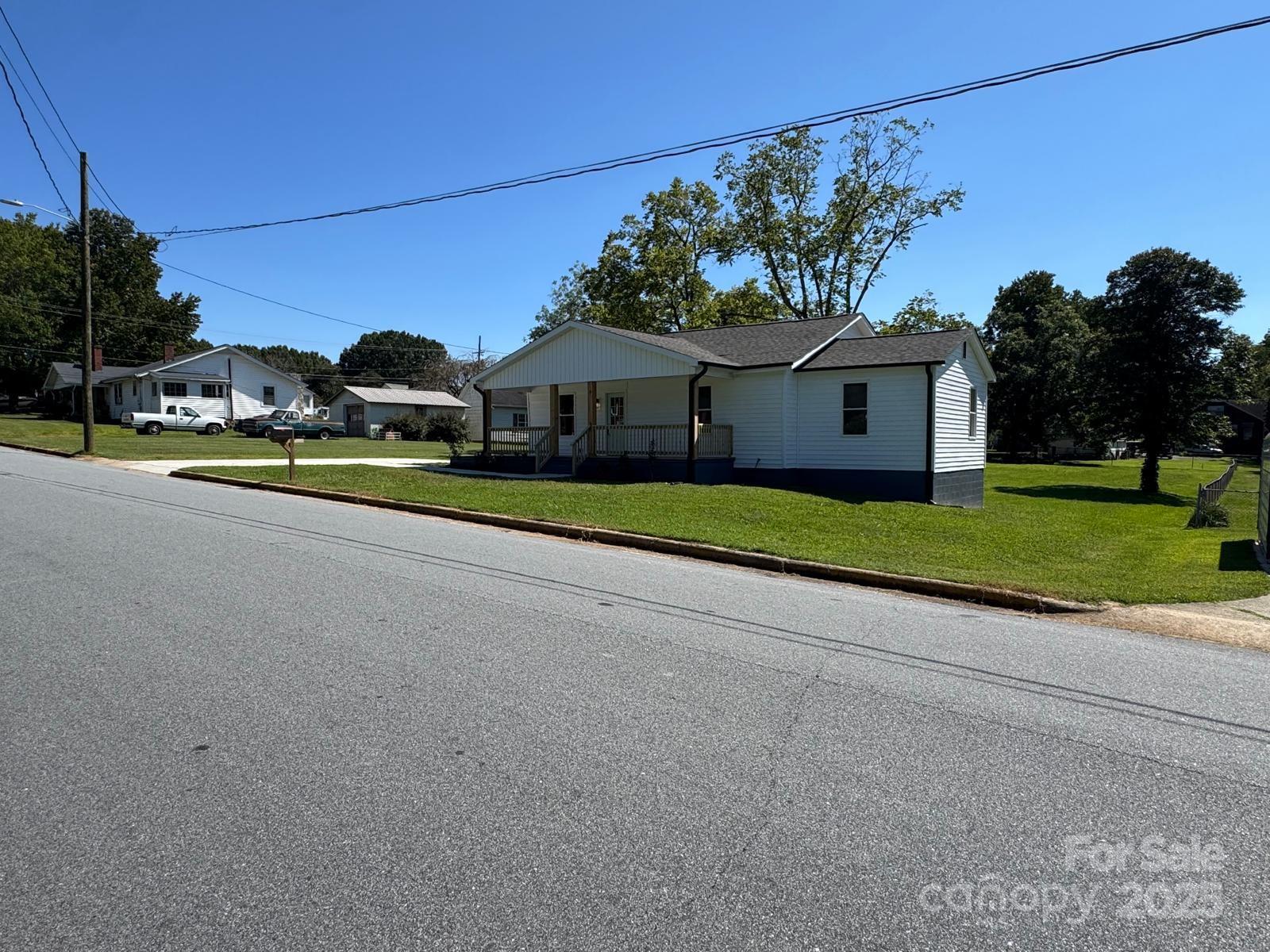 1018 Union Street Maiden, NC 28650 - Photo 41 of 46 a view of a house with a big yard plants and large trees