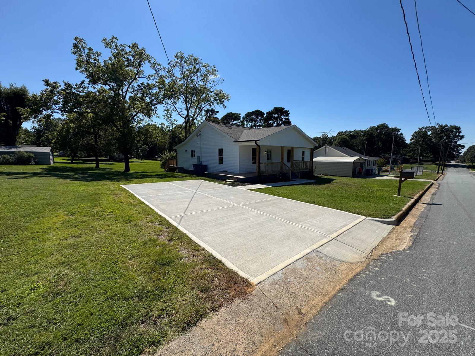 1018 Union Street Maiden, NC 28650 - Photo 42 of 46 a front view of a house with a yard