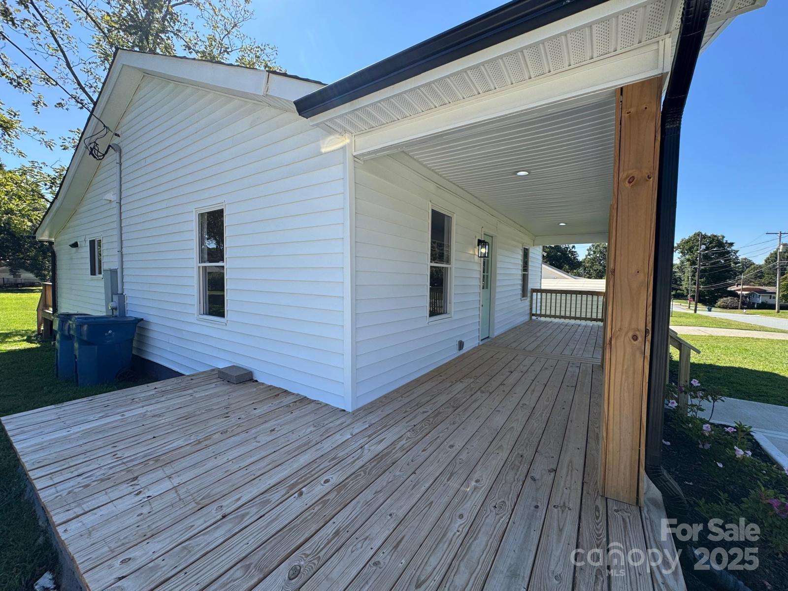1018 Union Street Maiden, NC 28650 - Photo 5 of 46 a view of a house with wooden deck