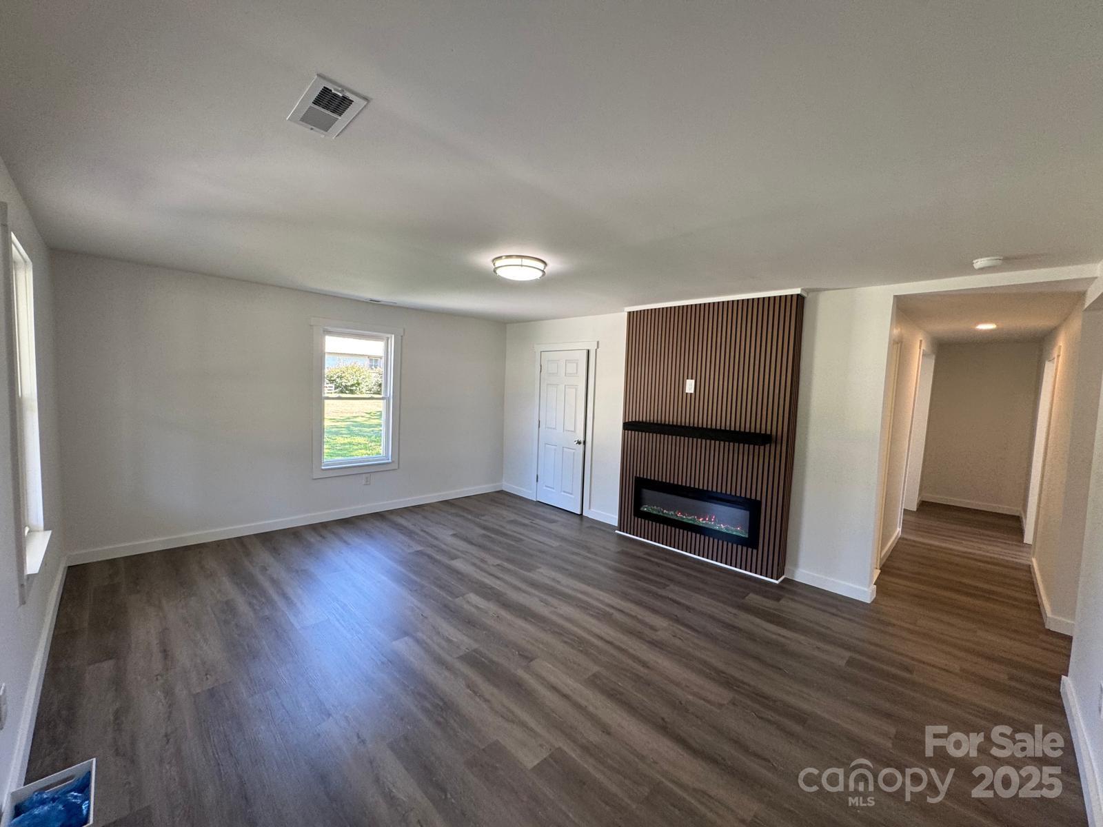 1018 Union Street Maiden, NC 28650 - Photo 6 of 46 wooden floor in an empty room with a window