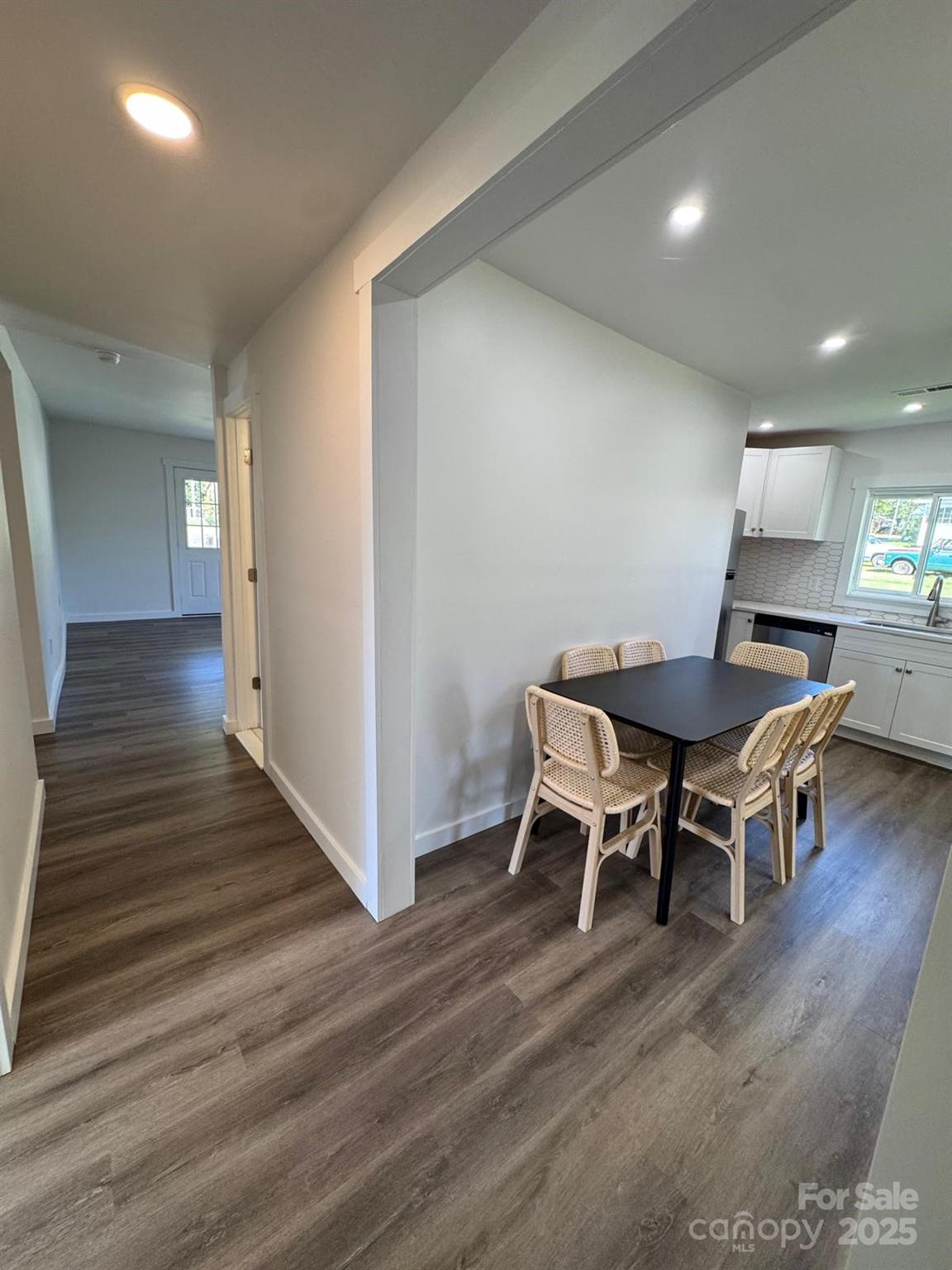 1018 Union Street Maiden, NC 28650 - Photo 9 of 46 a dining room with furniture and wooden floor