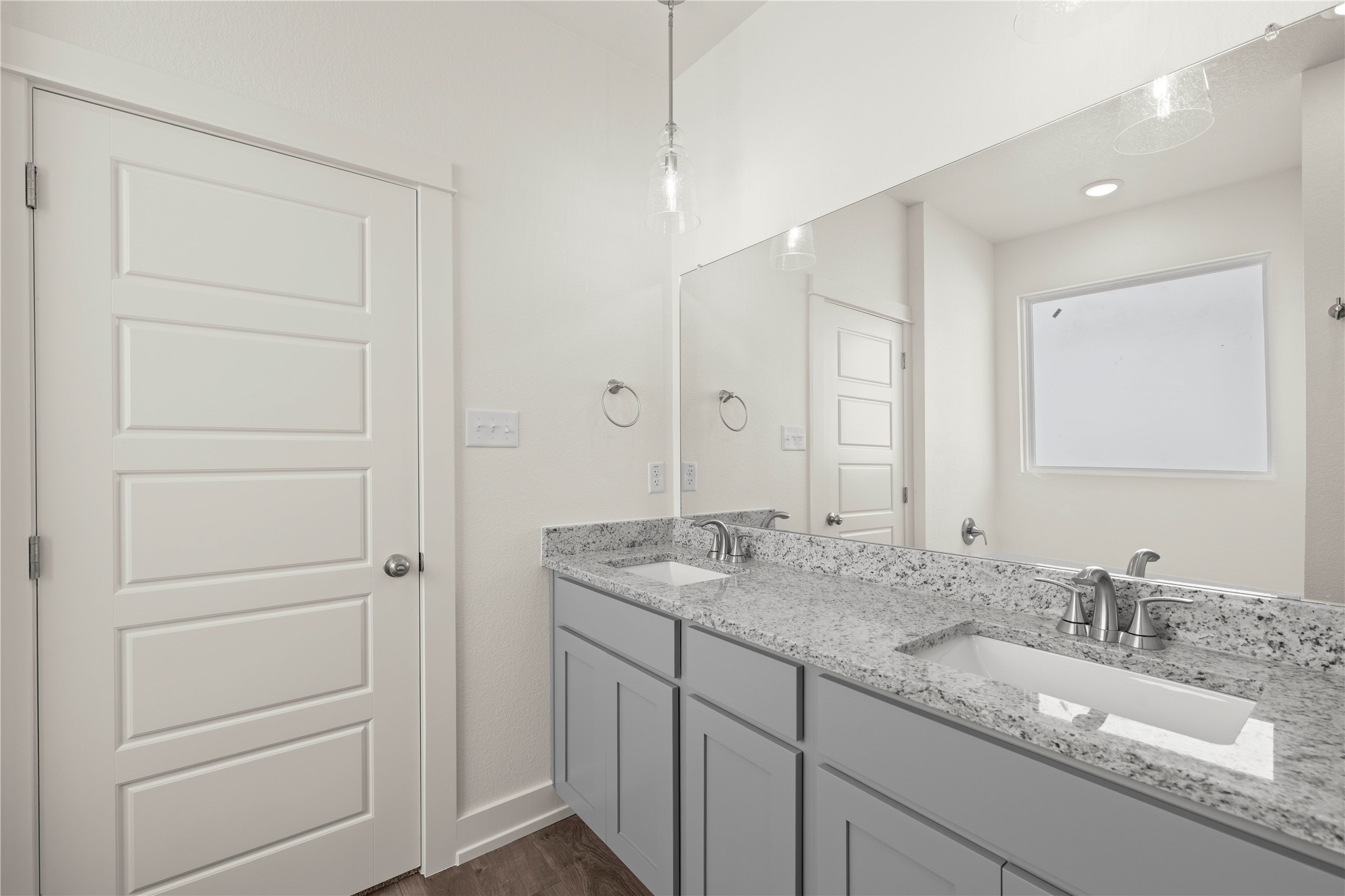 564 Gus Loop Georgetown, TX 78626 - Photo 29 of 32 a bathroom with a granite countertop sink and a mirror