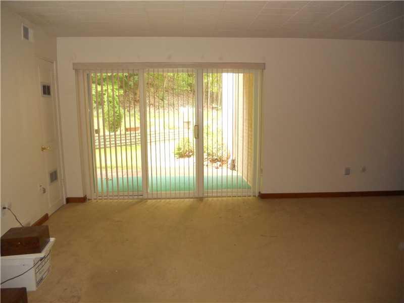 201 Coraopolis Road, Unit A2 Coraopolis, PA 15108 - Photo 7 of 16 Living Room. Sliders to private patio