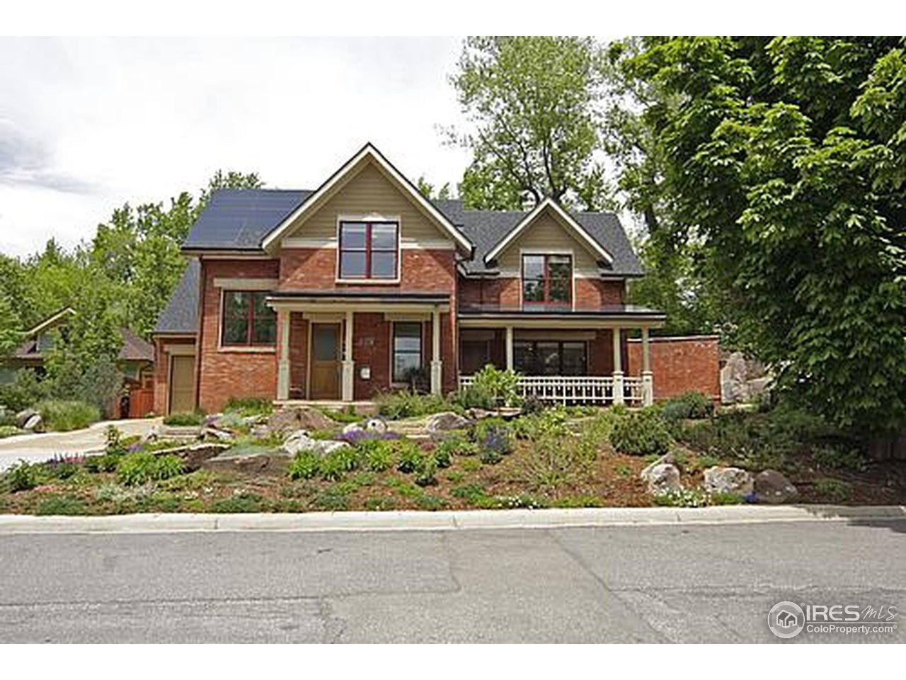 429 Spruce Street Boulder, CO 80302 - Photo 1 of 25 a front view of a house with a yard