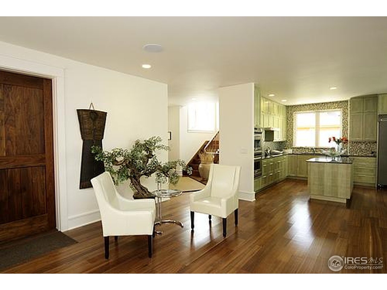 429 Spruce Street Boulder, CO 80302 - Photo 14 of 25 a view of a dining room with furniture and wooden floor