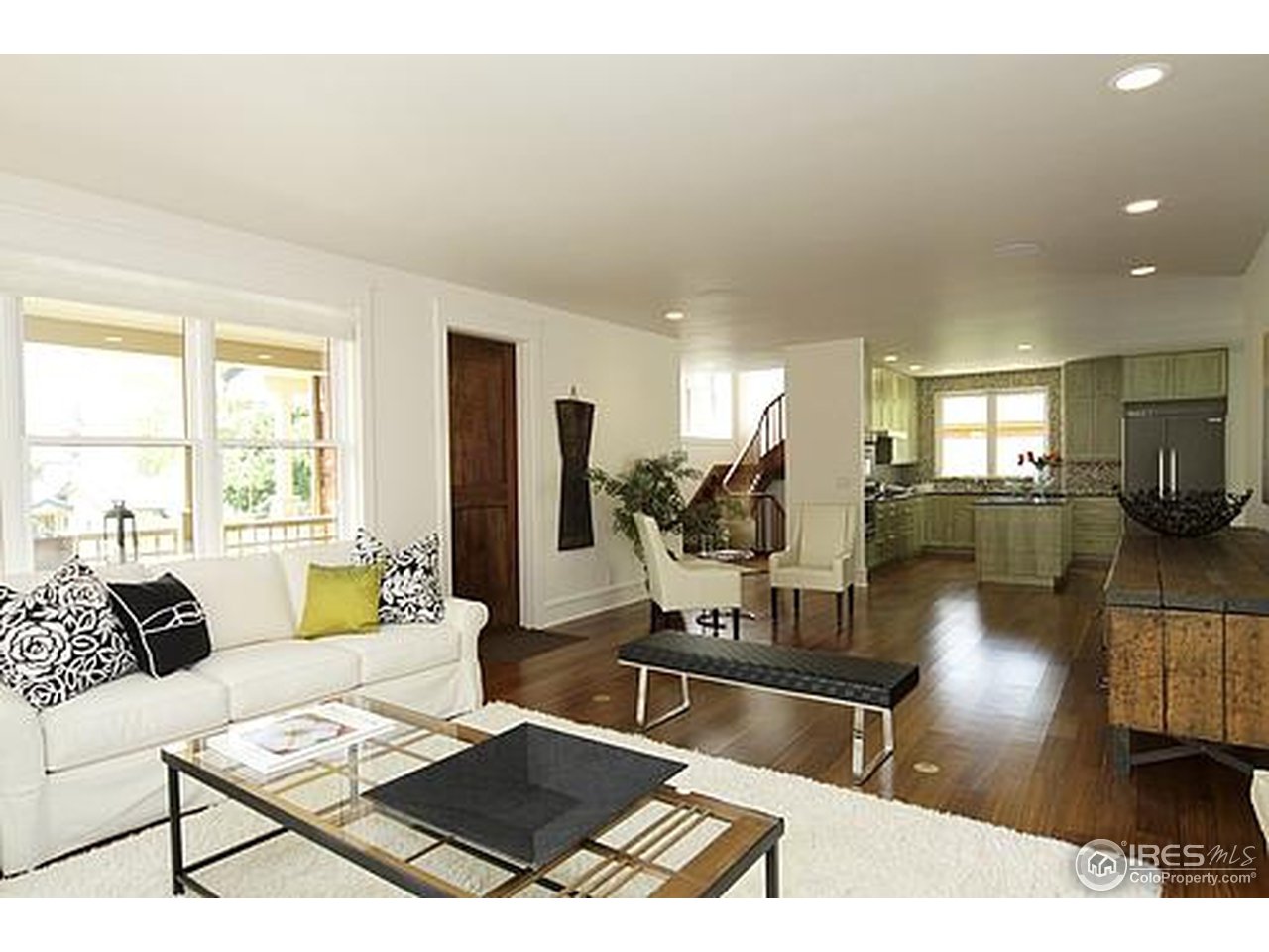 429 Spruce Street Boulder, CO 80302 - Photo 16 of 25 a living room with furniture and a wooden floor