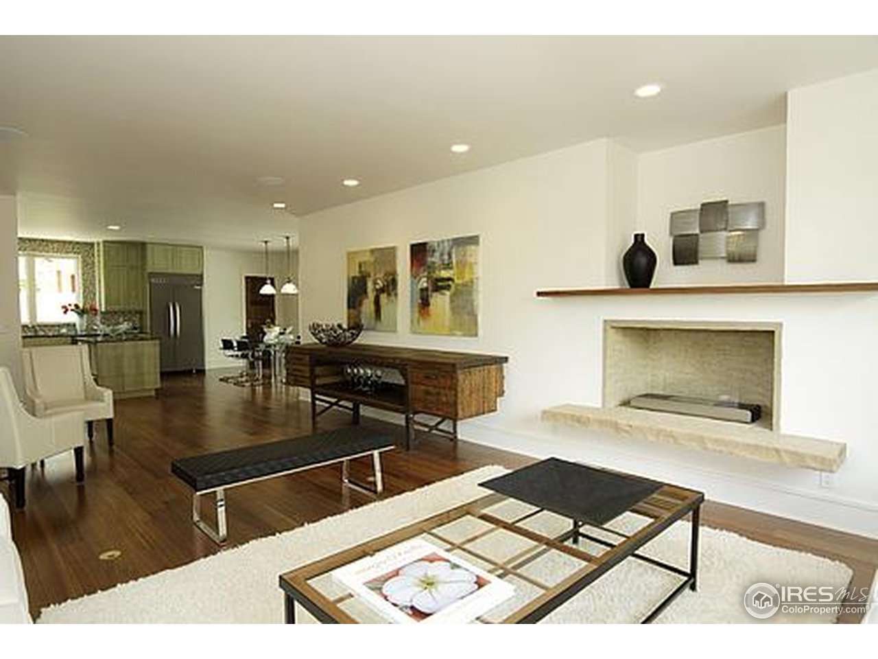 429 Spruce Street Boulder, CO 80302 - Photo 17 of 25 a living room with furniture a flat screen tv and a table