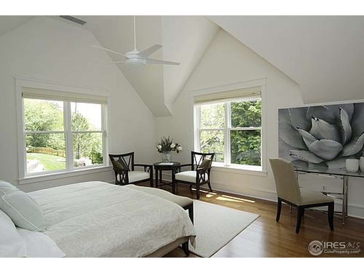 429 Spruce Street Boulder, CO 80302 - Photo 19 of 25 a living room with furniture and a large window