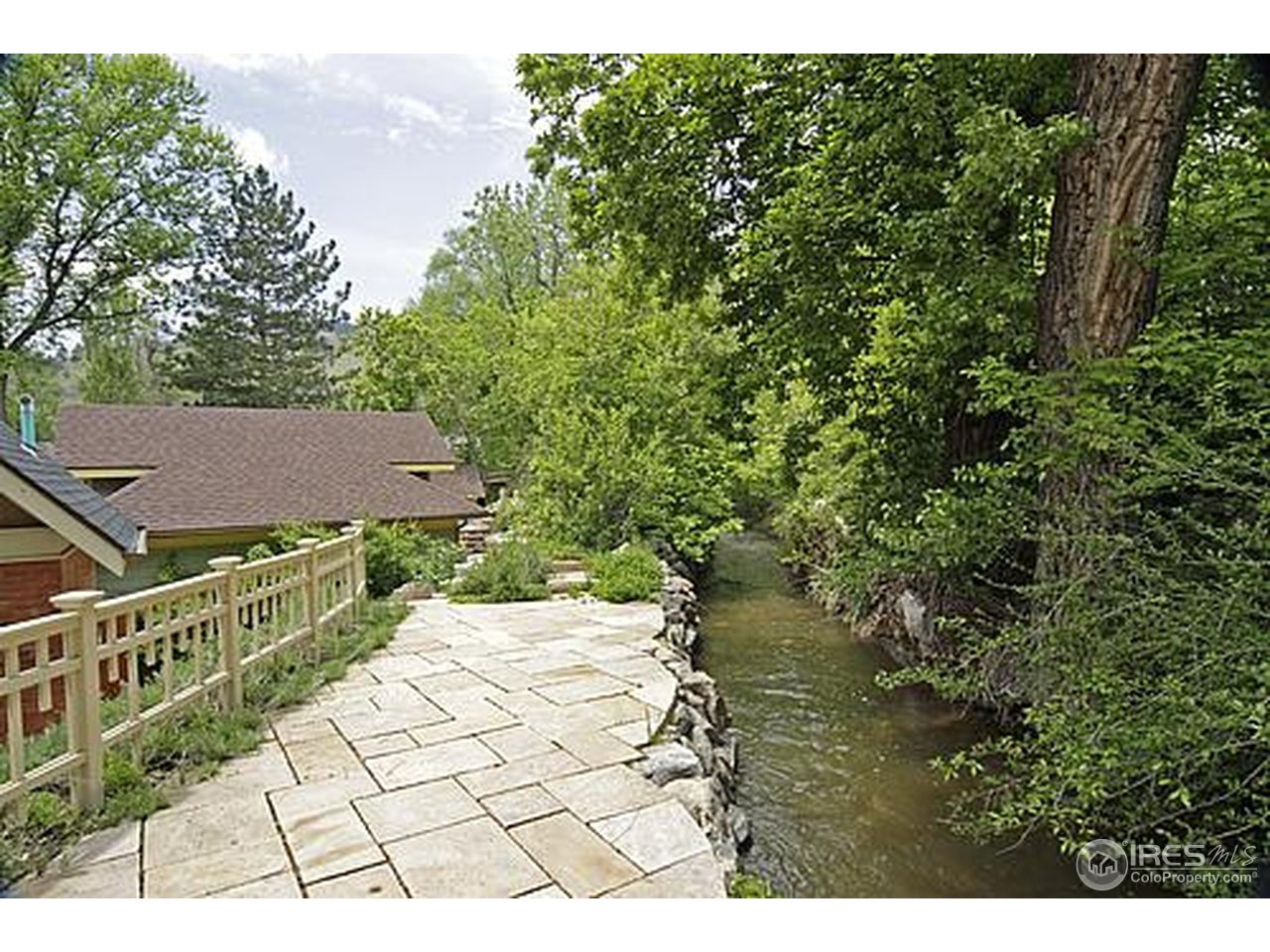 429 Spruce Street Boulder, CO 80302 - Photo 6 of 25 a view of a house with a yard