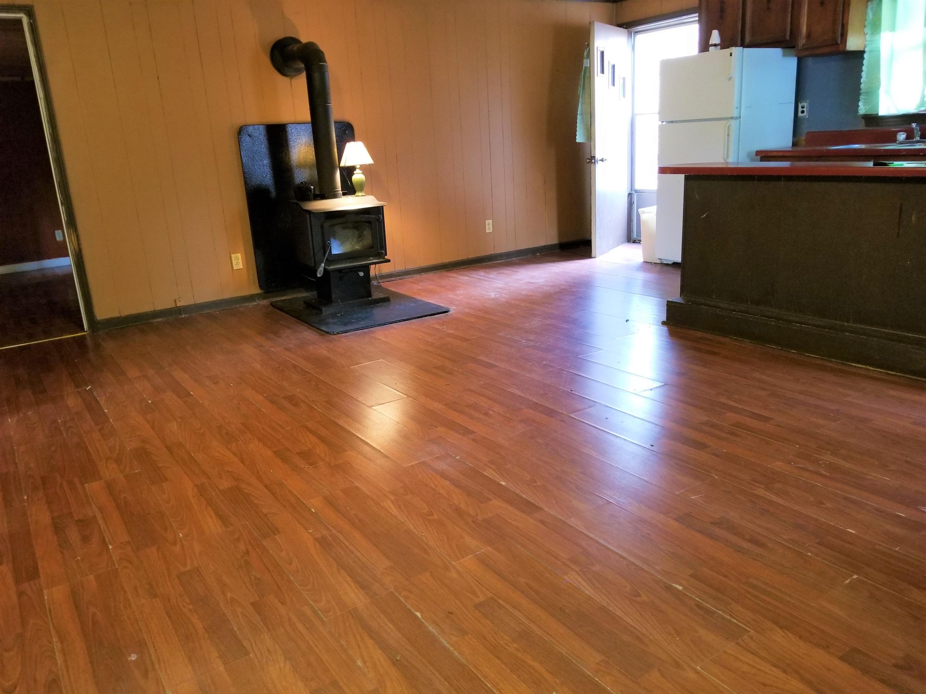 156 Prillaman Switch Road Ferrum, VA 24088 - Photo 4 of 24 a living room with furniture and a fireplace