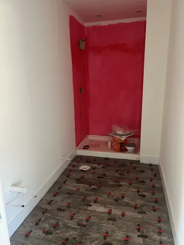 a bathroom with a mirror