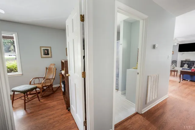 a view of a porch with wooden floor and outdoor space