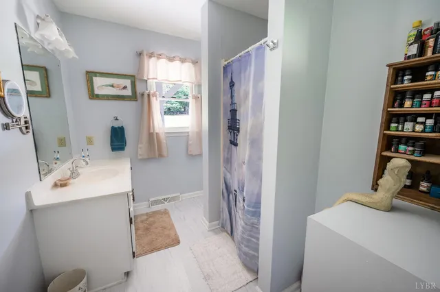 a front view of a house with yard porch and green space