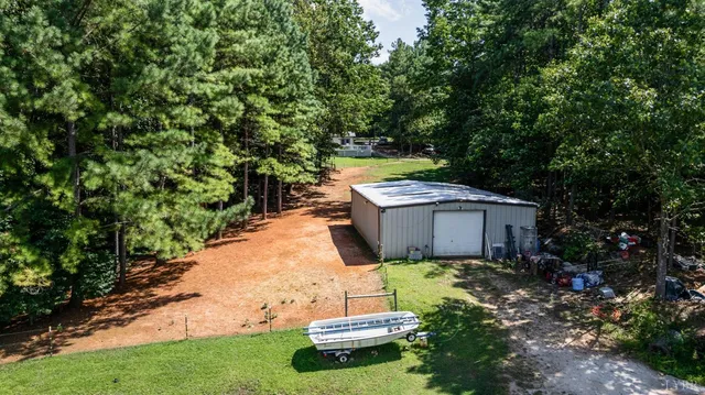 a view of a deck with a yard