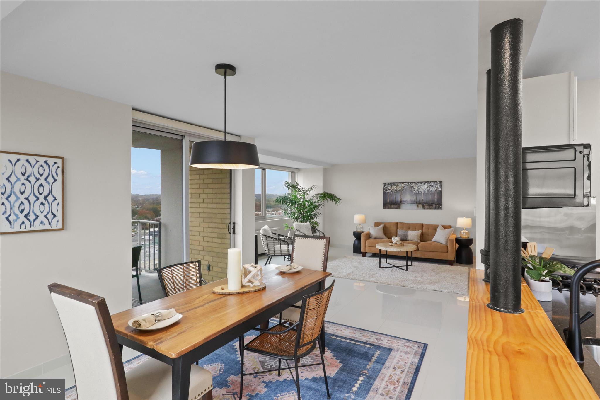 301 North Beauregard Street, Unit 1605 Alexandria, VA 22312 - Photo 1 of 42 a dining room with furniture and wooden floor