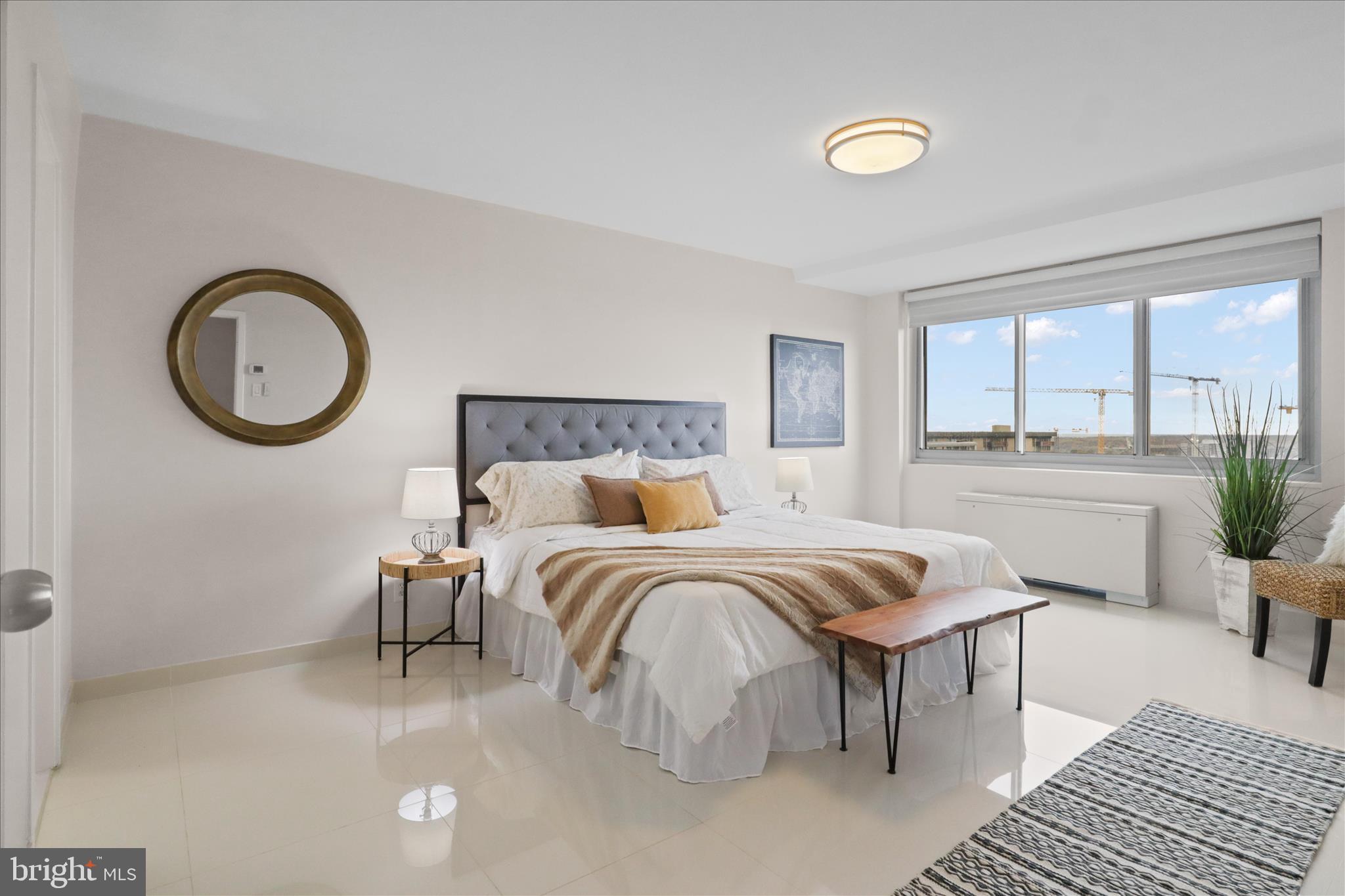 301 North Beauregard Street, Unit 1605 Alexandria, VA 22312 - Photo 17 of 42 a bedroom with a bed and window