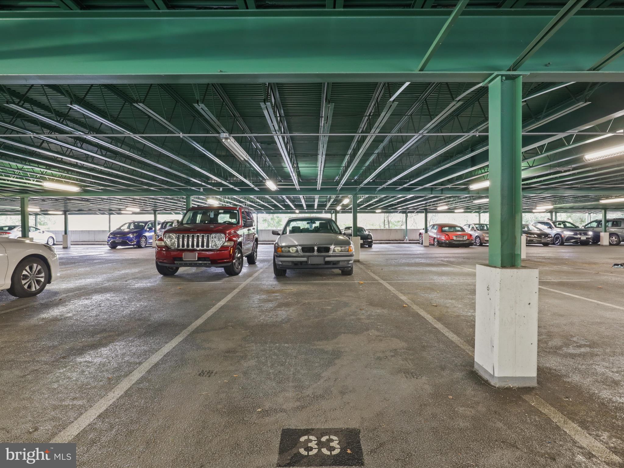 301 North Beauregard Street, Unit 1605 Alexandria, VA 22312 - Photo 25 of 42 a view of parking space with parked cars