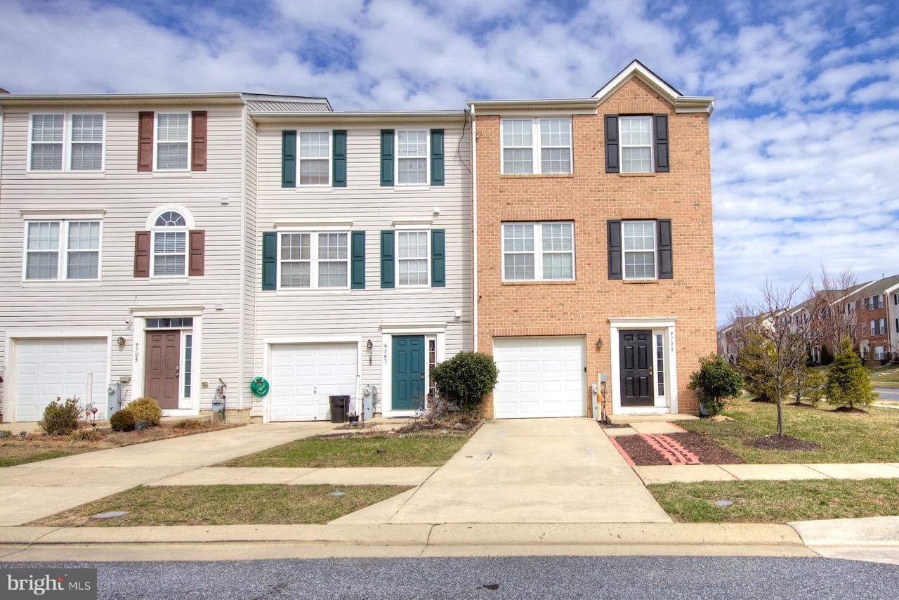 9701 Selfridge Road Baltimore, MD 21220 - Photo 2 of 29 a front view of a house with a yard