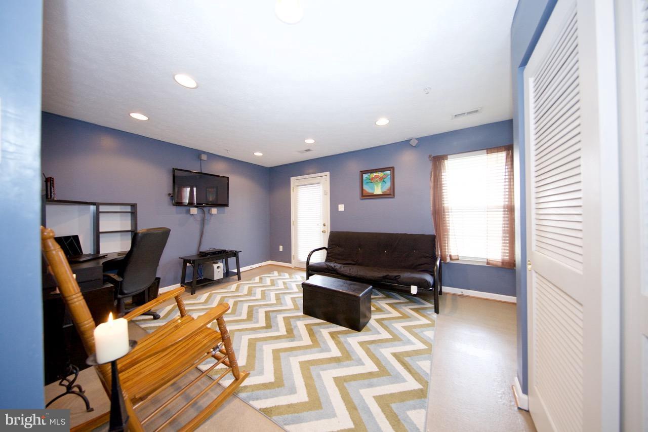9701 Selfridge Road Baltimore, MD 21220 - Photo 24 of 29 a living room with furniture and a window