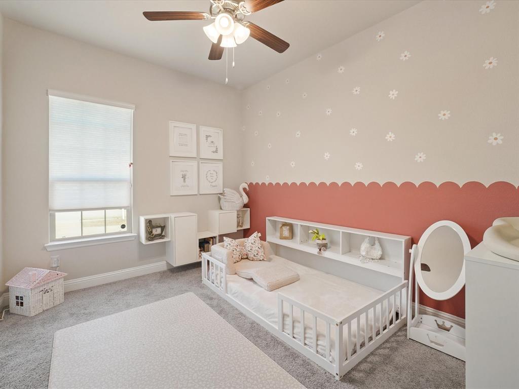 3711 Walnut Rdg Drive Grand Prairie, TX 76065 - Photo 19 of 24 a spacious bedroom with a bed and window