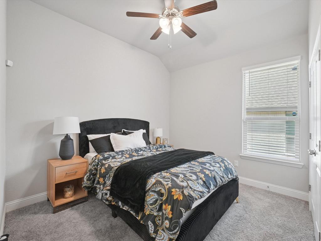 3711 Walnut Rdg Drive Grand Prairie, TX 76065 - Photo 20 of 24 a bedroom with a bed and a window