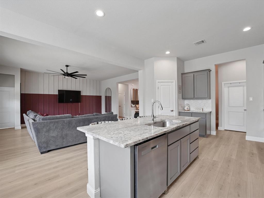 3711 Walnut Rdg Drive Grand Prairie, TX 76065 - Photo 10 of 24 a spacious bathroom with a granite countertop sink a mirror and shower