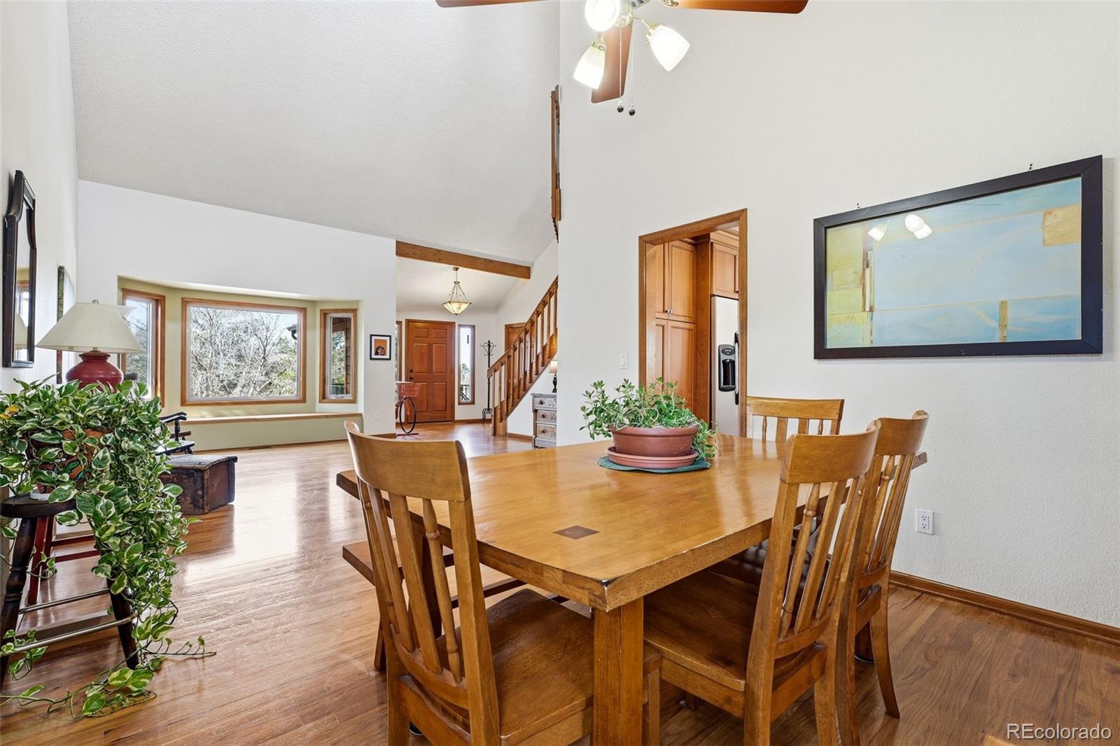 8915 Mad River Road Parker, CO 80134 - Photo 8 of 45 a view of a dining room with furniture and window