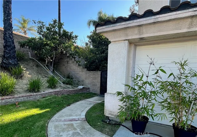 a view of a house with a garden