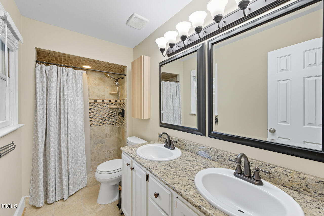 8713 Mourning Dove Road Raleigh, NC 27615 - Photo 24 of 56 Primary Bath