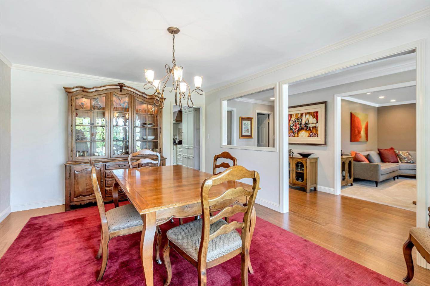 1929 Fordham Way Mountain View, CA 94040 - Photo 17 of 45 a view of a dining room with furniture wooden floor and chandelier