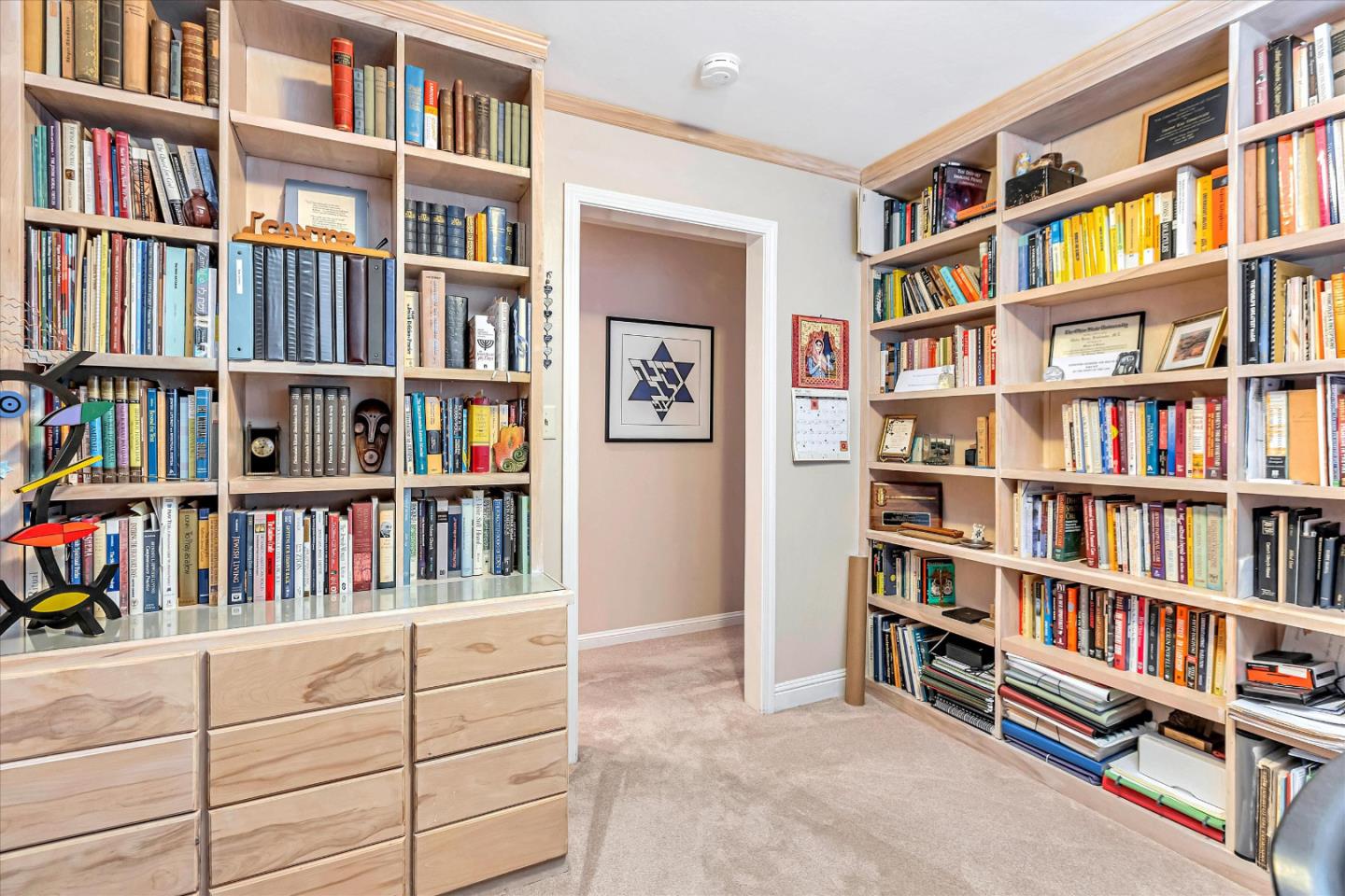1929 Fordham Way Mountain View, CA 94040 - Photo 19 of 45 a room with a book shelf and a book shelf