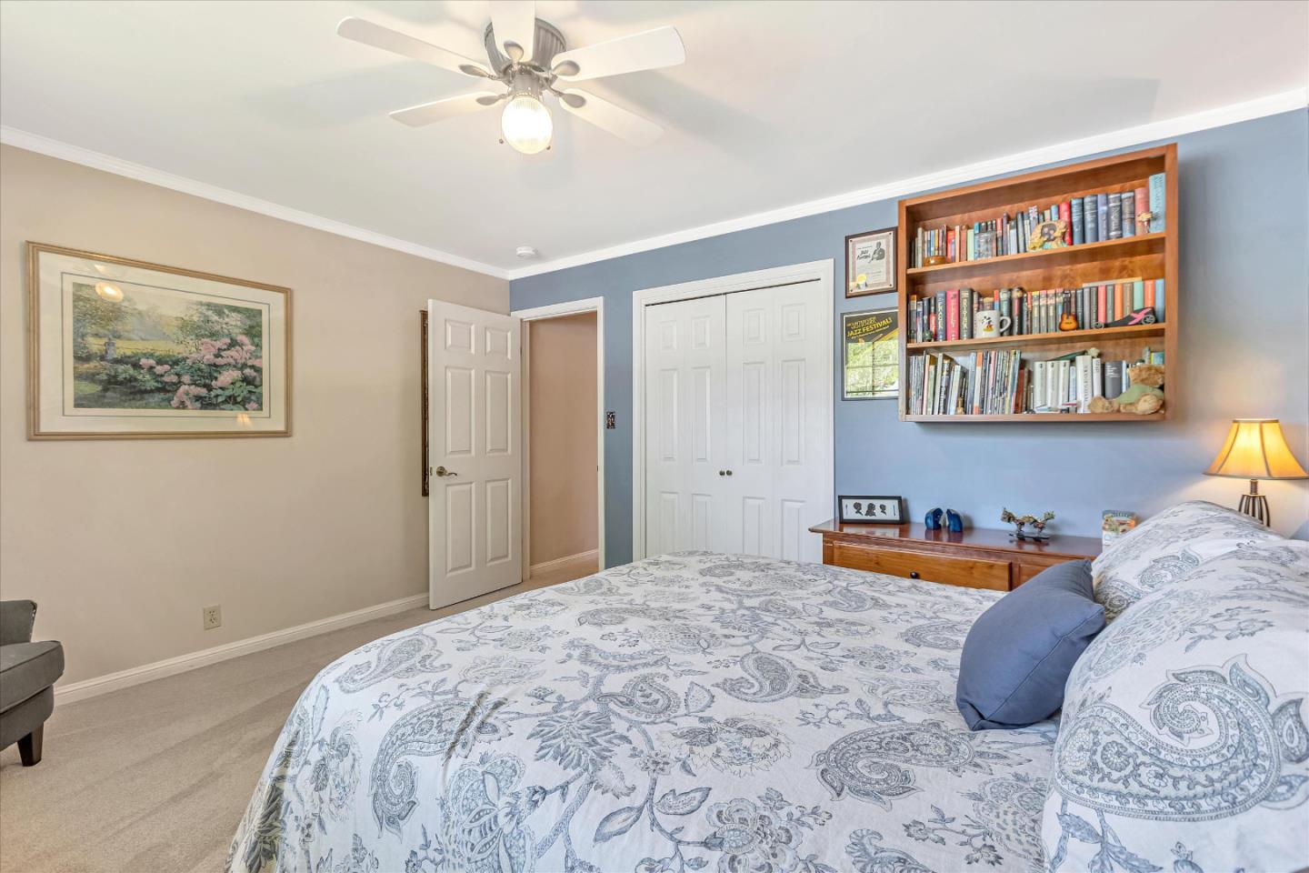 1929 Fordham Way Mountain View, CA 94040 - Photo 21 of 45 a bedroom with a bed and a book shelf