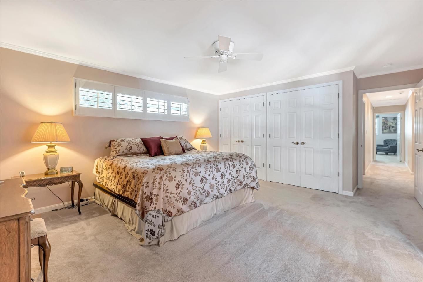 1929 Fordham Way Mountain View, CA 94040 - Photo 24 of 45 a bedroom with a bed and a lamp