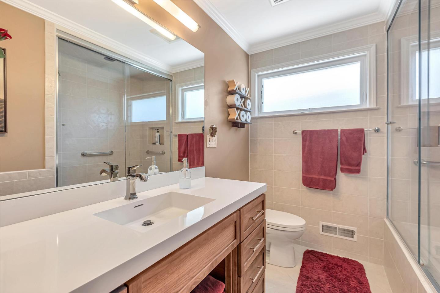 1929 Fordham Way Mountain View, CA 94040 - Photo 25 of 45 a bathroom with a sink a toilet and shower curtain