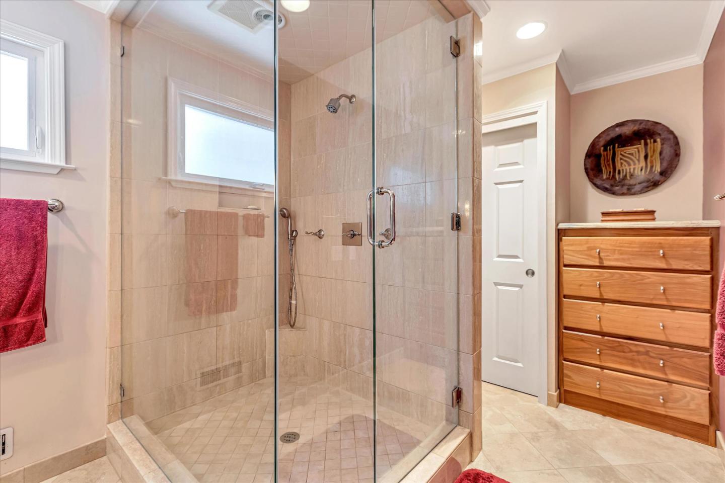 1929 Fordham Way Mountain View, CA 94040 - Photo 27 of 45 a bathroom with a shower a mirror and a sink