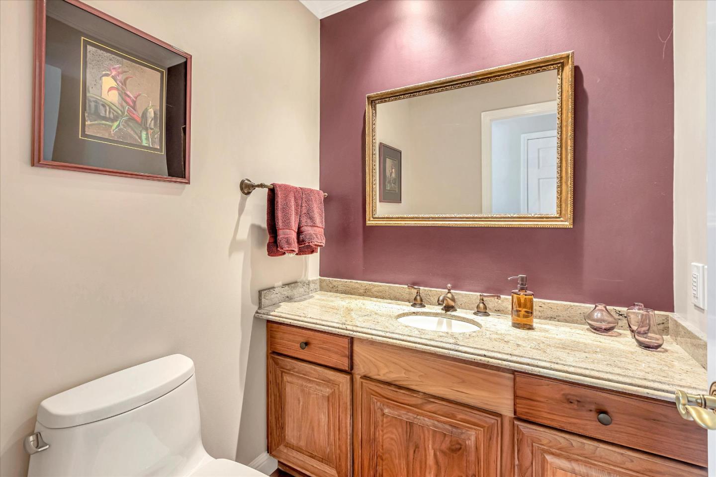1929 Fordham Way Mountain View, CA 94040 - Photo 28 of 45 a bathroom with a granite countertop toilet sink and mirror