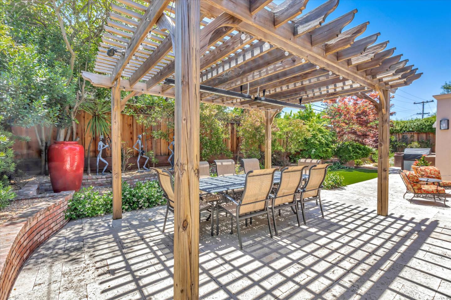 1929 Fordham Way Mountain View, CA 94040 - Photo 35 of 45 a view of a patio with a table chairs and a backyard